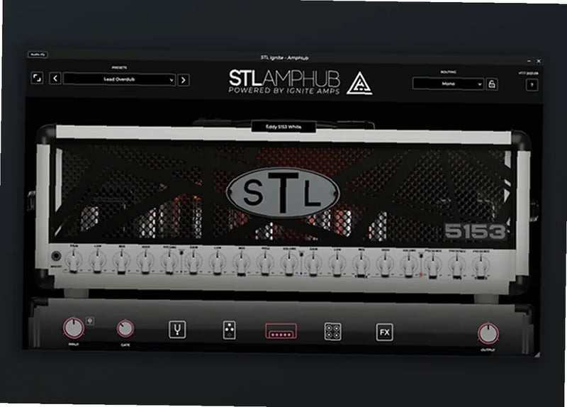 Guitarist uses STL Tones plugin interface with amp models and effects routing displayed on screen