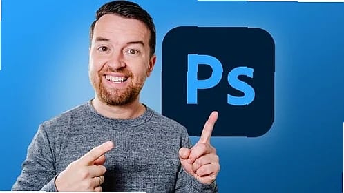 Student learns photo editing in Photoshop, adjusting layers and tools on dual monitors, creative workspace setup